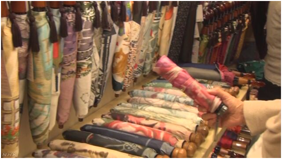 赴日中国游客改“口味”，折叠伞成人气商品