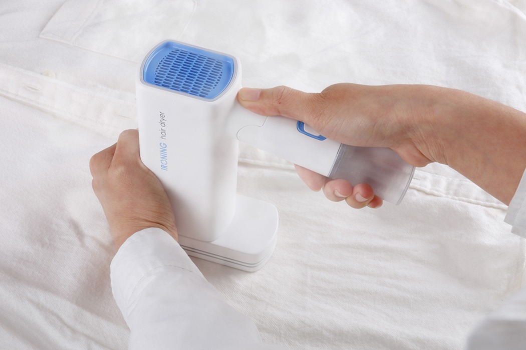 吹风机和熨斗组合设计，使忙碌的旅行者更便利